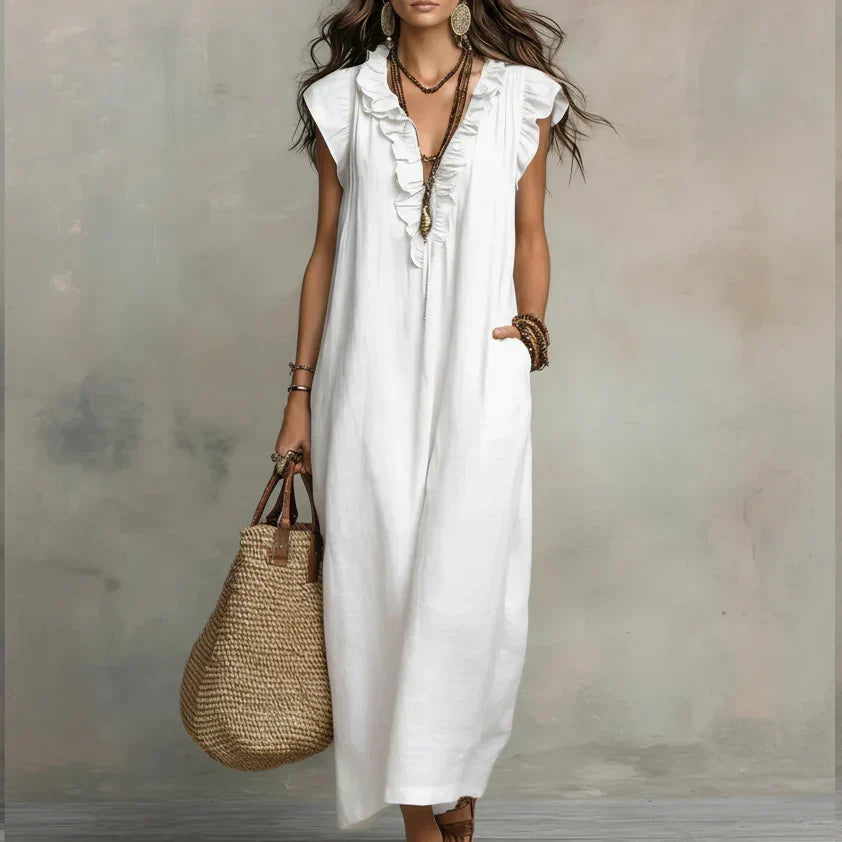 Merel | Lange bohemian jurk met volantdetails en functionele zakken