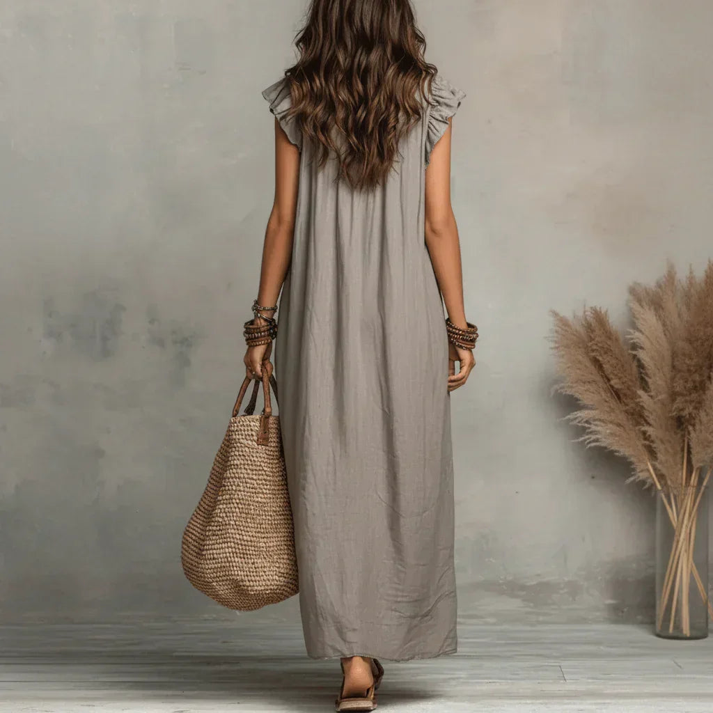 Merel | Lange bohemian jurk met volantdetails en functionele zakken