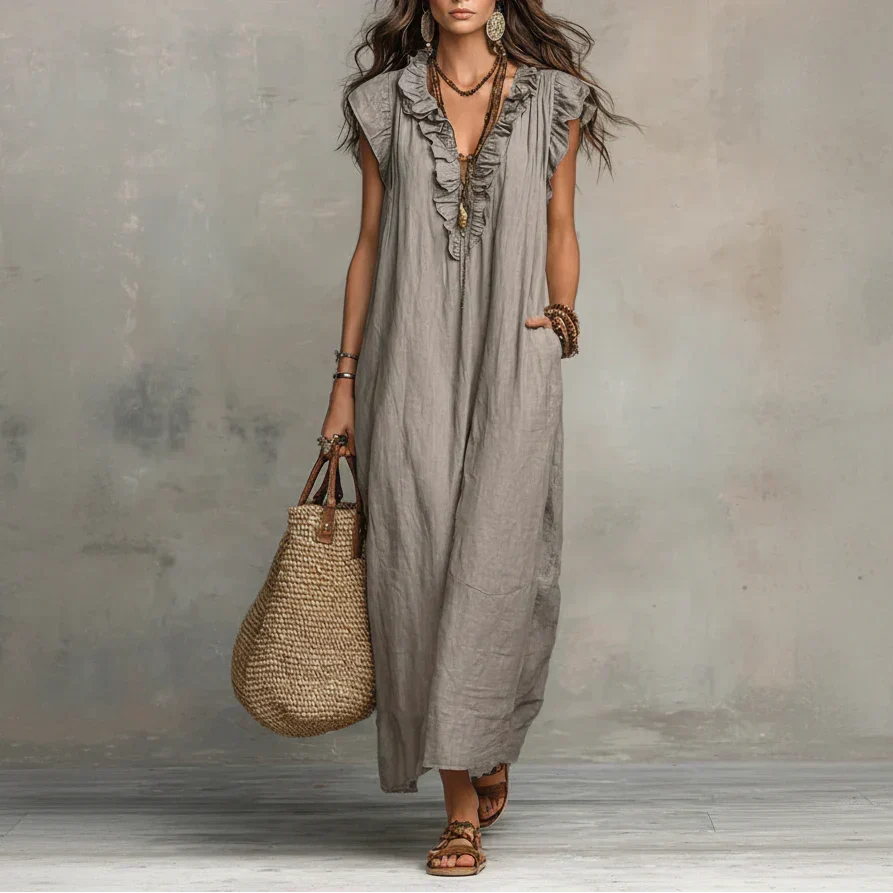 Merel | Lange bohemian jurk met volantdetails en functionele zakken