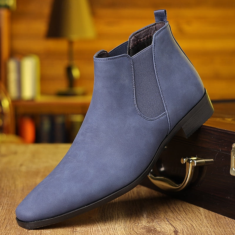 Chelsea boots met elastische zijpanelen en lage hak