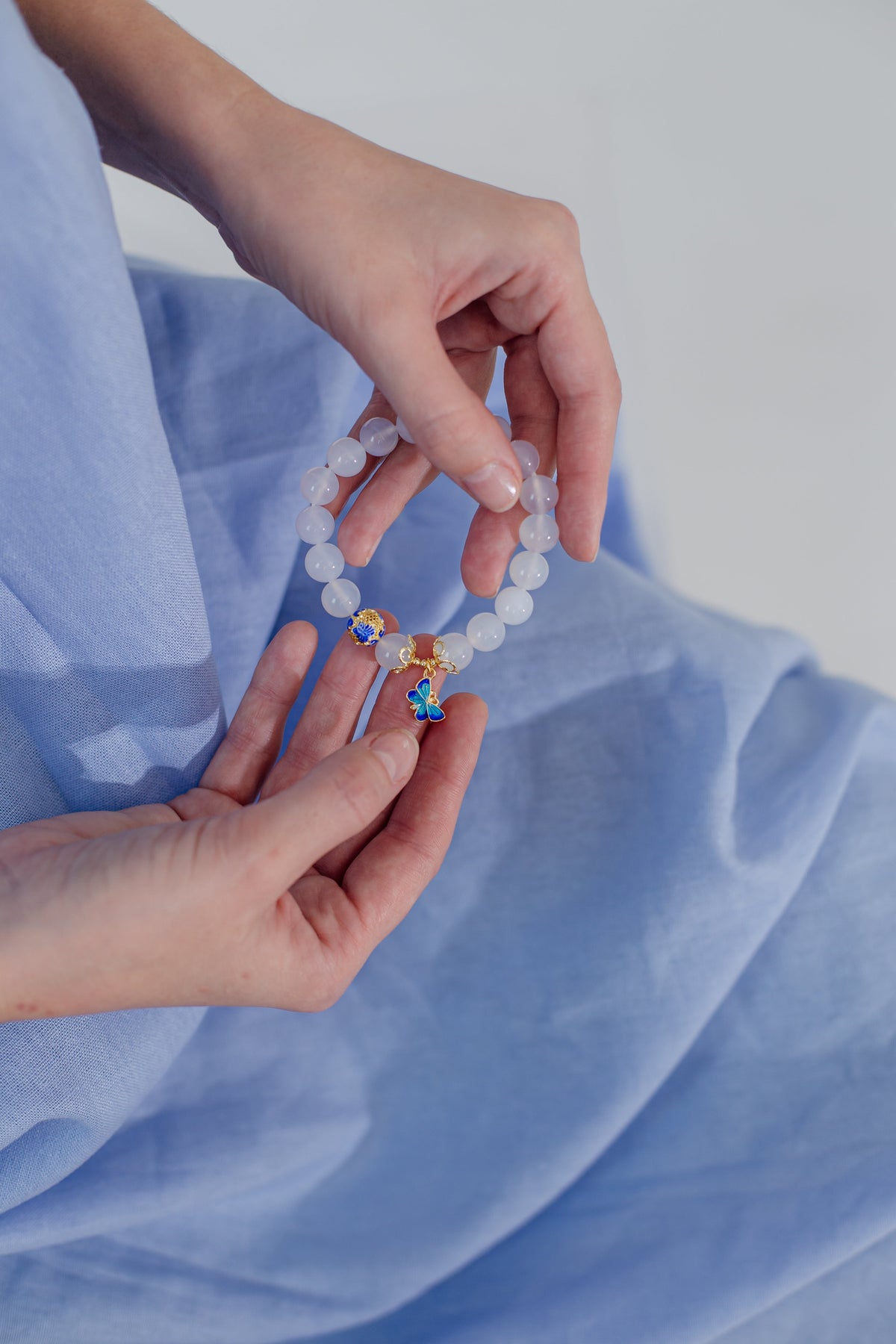 Vlinder witte agaat armband