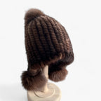 Bontmuts van wezel met vosbont pompon