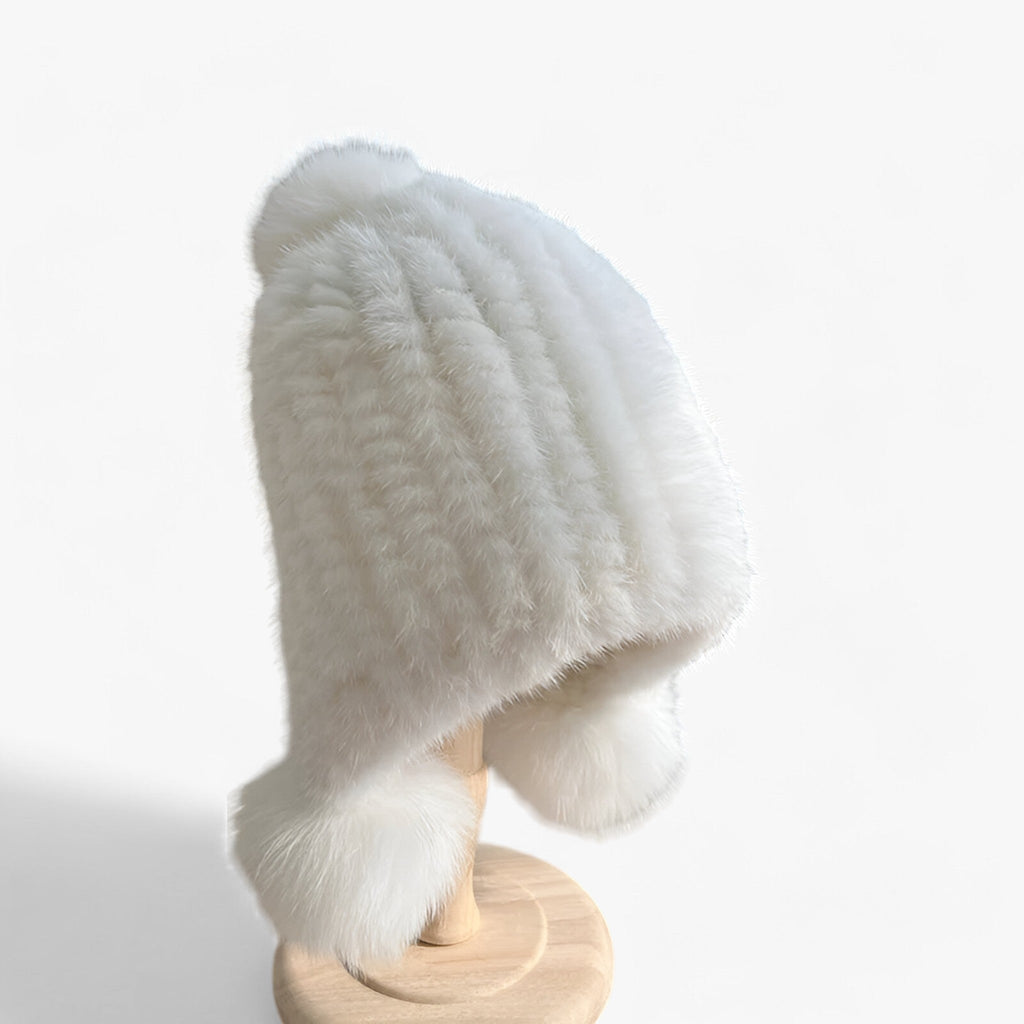 Bontmuts van wezel met vosbont pompon