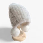 Bontmuts van wezel met vosbont pompon