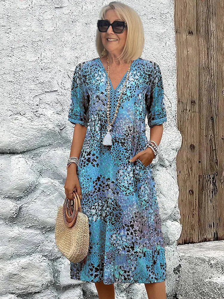Ida | Plus-size midi-jurk met V-hals en bloemenprint