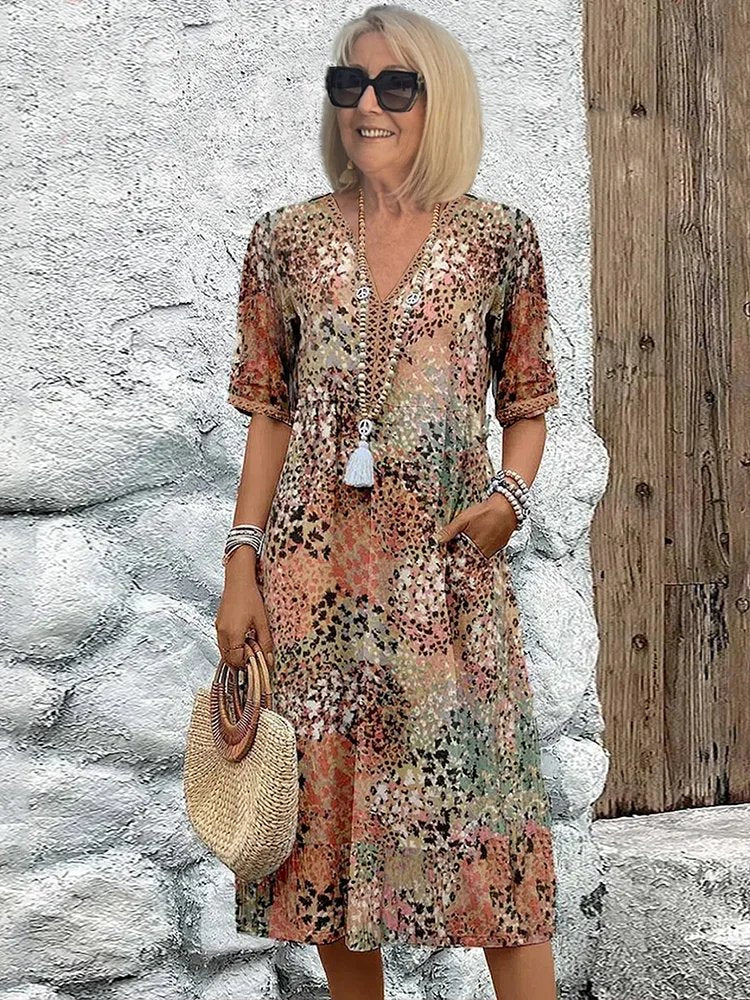 Ida | Plus-size midi-jurk met V-hals en bloemenprint