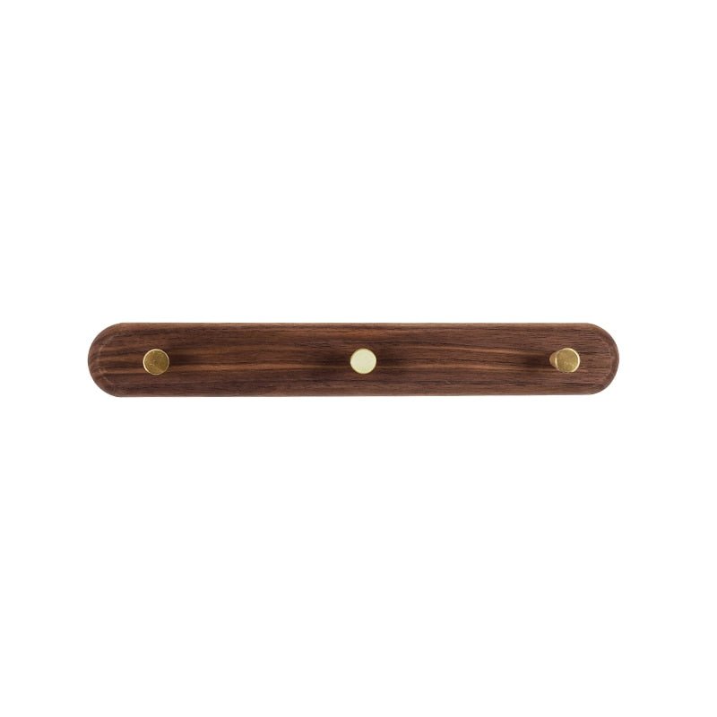 Wandkapstok van hout met messing haken