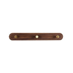 Wandkapstok van hout met messing haken