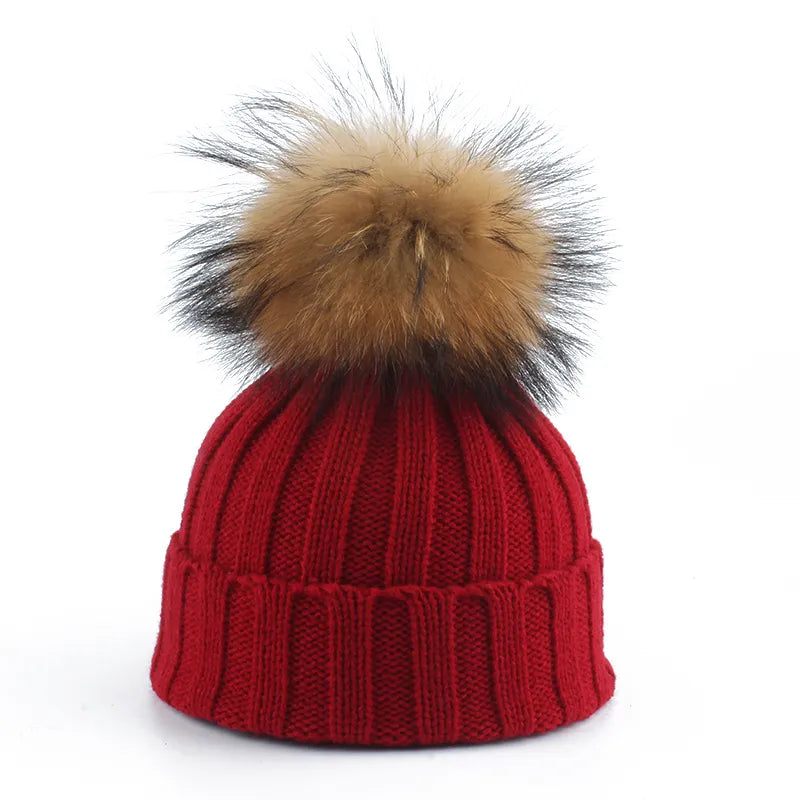 Gebreide winter pom-pom muts
