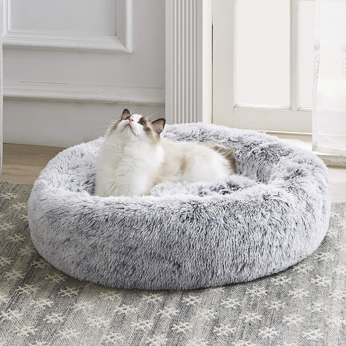 Pluchen huisdierenbed in donutvorm