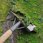Multifunctionele schoonmaakschep met schraperfunctie