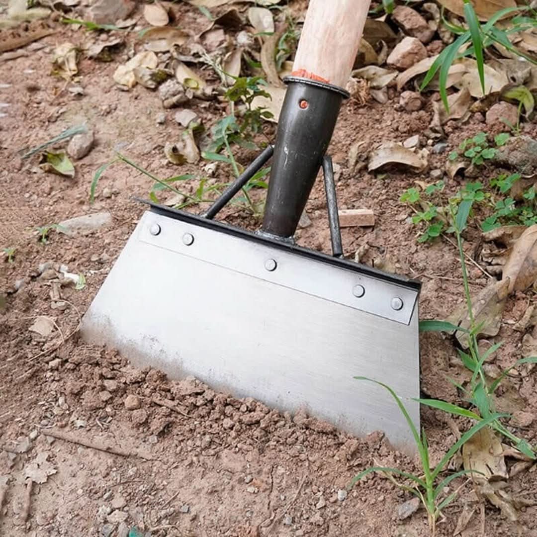 Multifunctionele schoonmaakschep met schraperfunctie