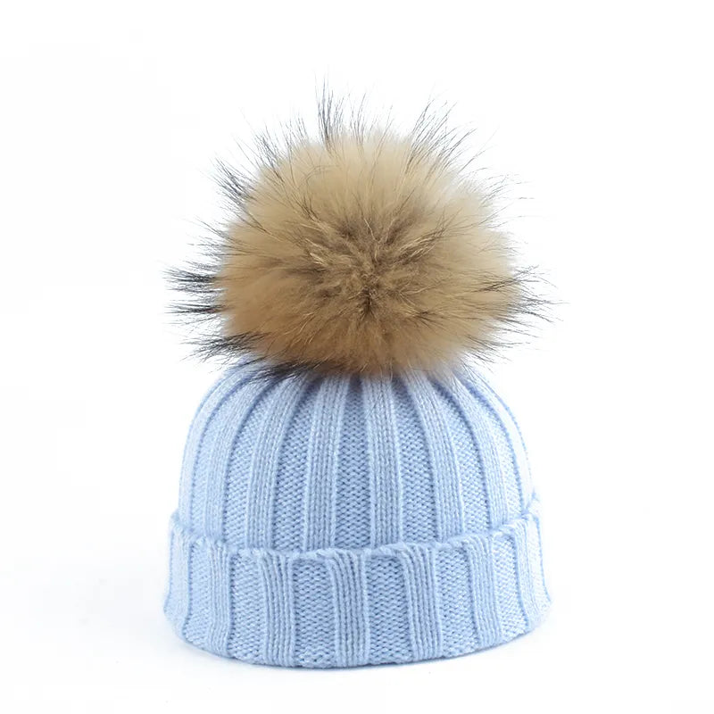 Gebreide winter pom-pom muts