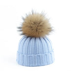 Gebreide winter pom-pom muts