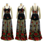 Maxi jurk met bloemenborduursel en spaghettibandjes