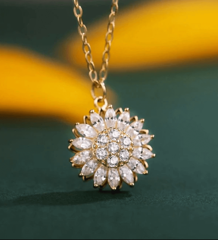 Roterende zonnebloem ketting