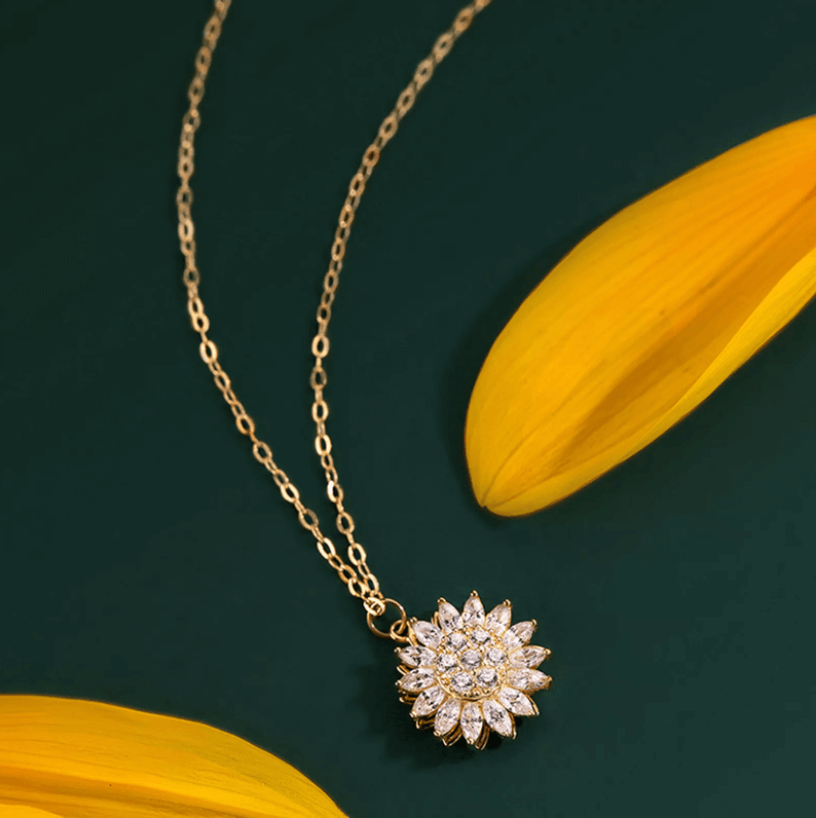 Roterende zonnebloem ketting
