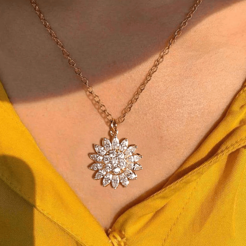 Roterende zonnebloem ketting