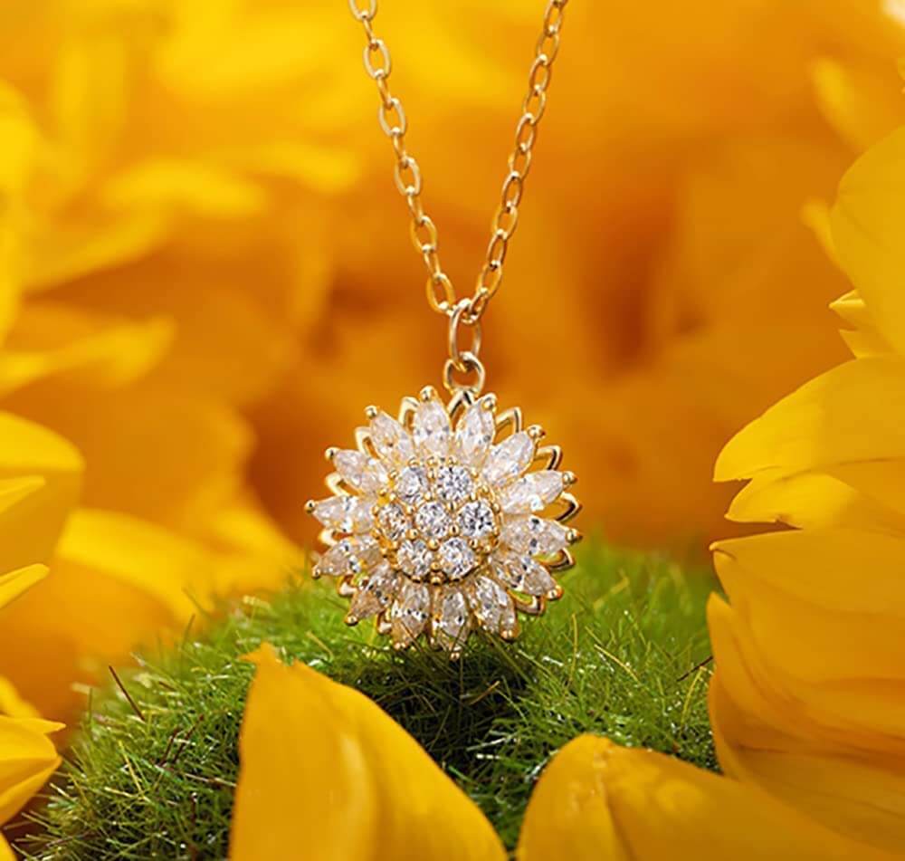Roterende zonnebloem ketting