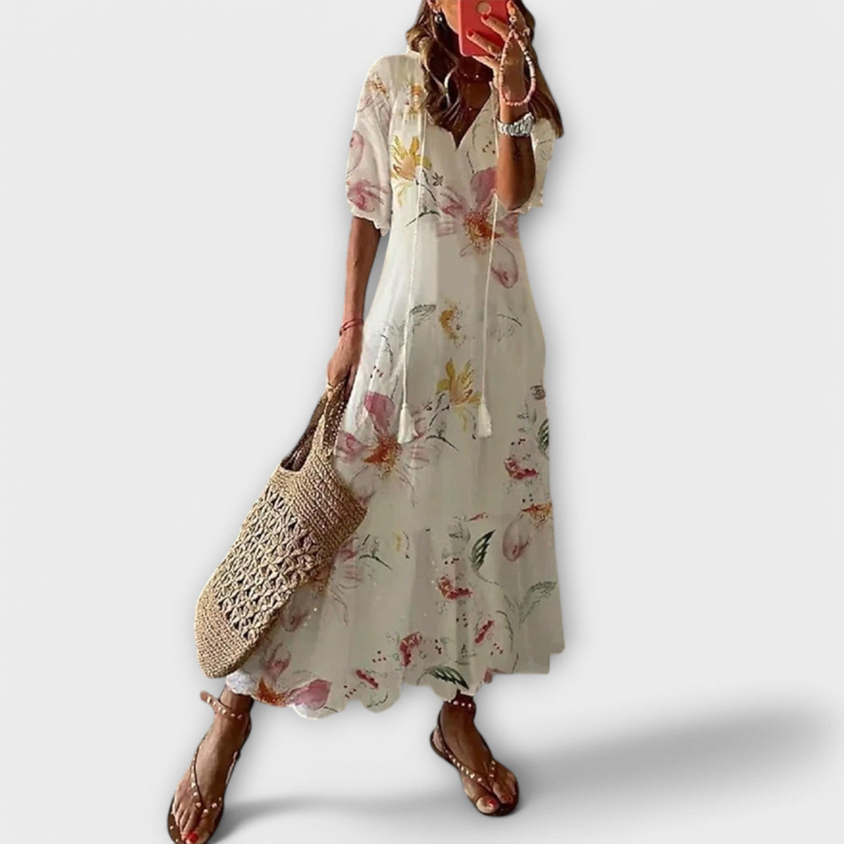 Jeannette | Boho-maxijurk met print en strikceintuur