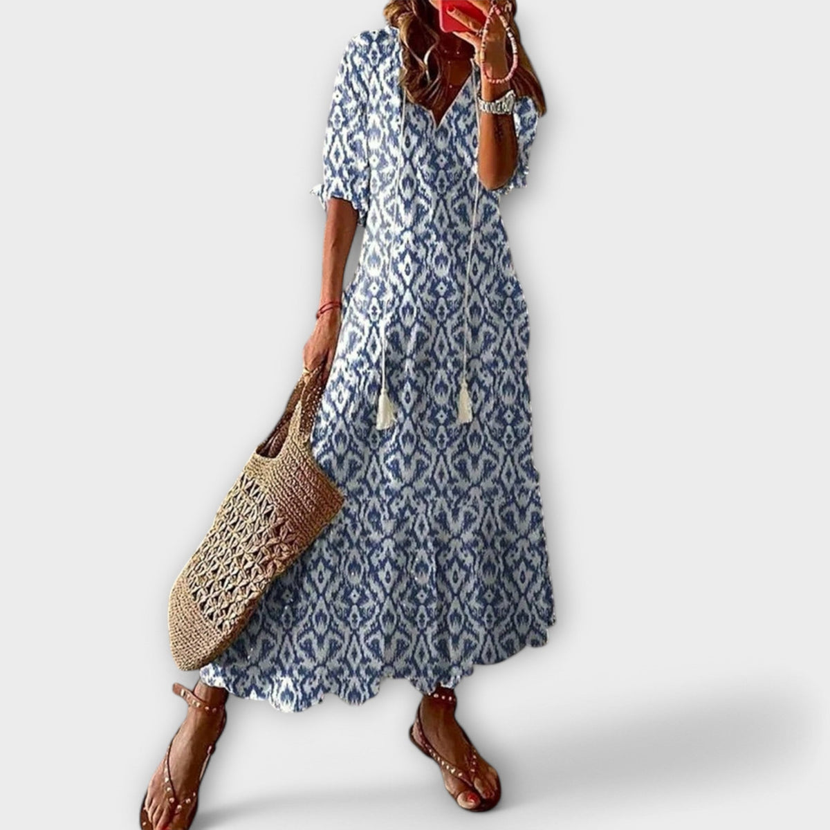 Jeannette | Boho-maxijurk met print en strikceintuur