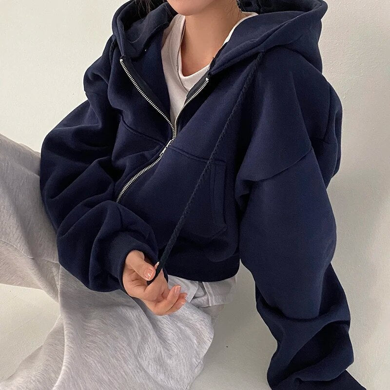 Kort dames vest met capuchon en oversized pasvorm