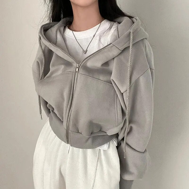 Kort dames vest met capuchon en oversized pasvorm