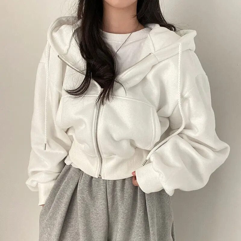Kort dames vest met capuchon en oversized pasvorm