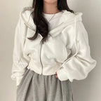 Kort dames vest met capuchon en oversized pasvorm