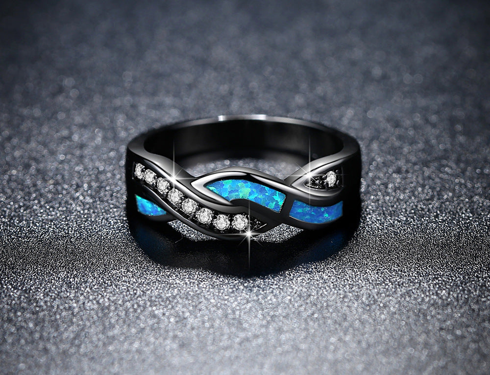 Blauwe ring met golfmotief