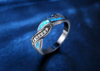 Blauwe ring met golfmotief
