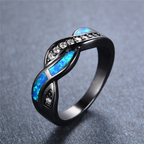 Blauwe ring met golfmotief