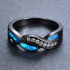 Blauwe ring met golfmotief