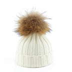 Gebreide winter pom-pom muts