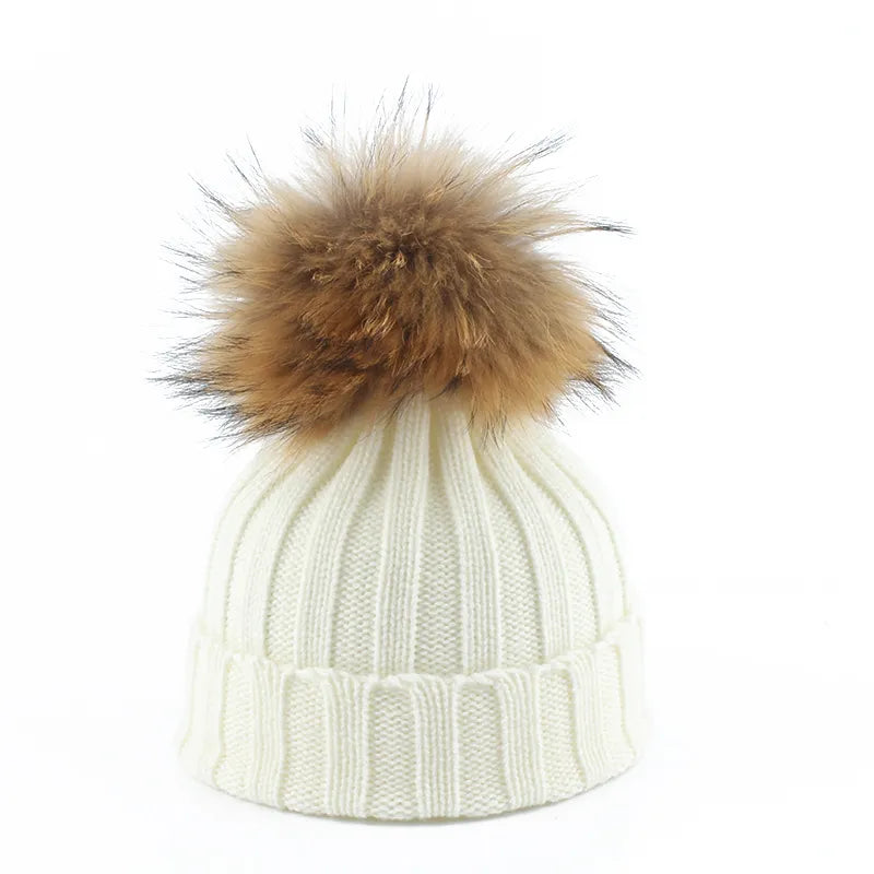 Gebreide winter pom-pom muts