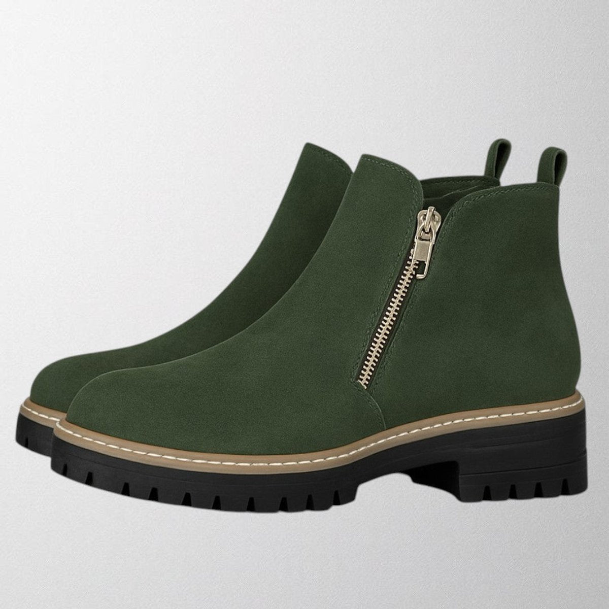 Damesenkellaarzen van suède met goudkleurige zijrits en grove profielzool