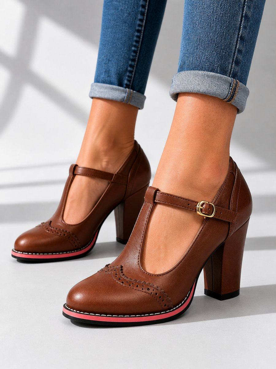 Damesenkellaarzen in leerlook met broguedetails en T-band