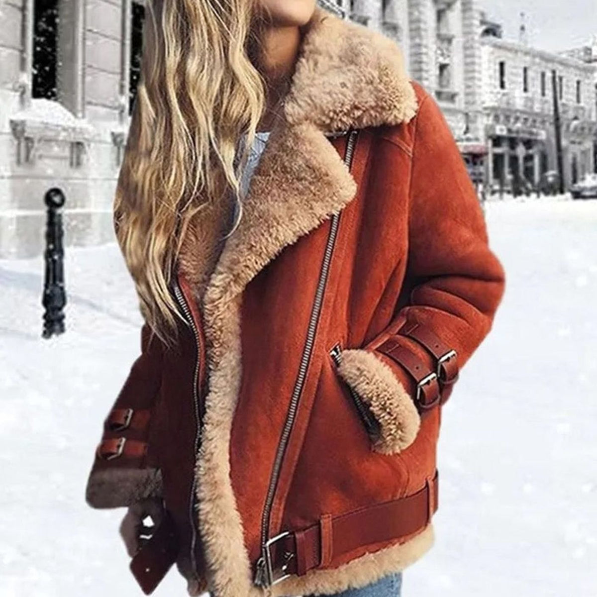 Phileine | Oversized damesmotorjack met imitatie-shearling en ceintuur