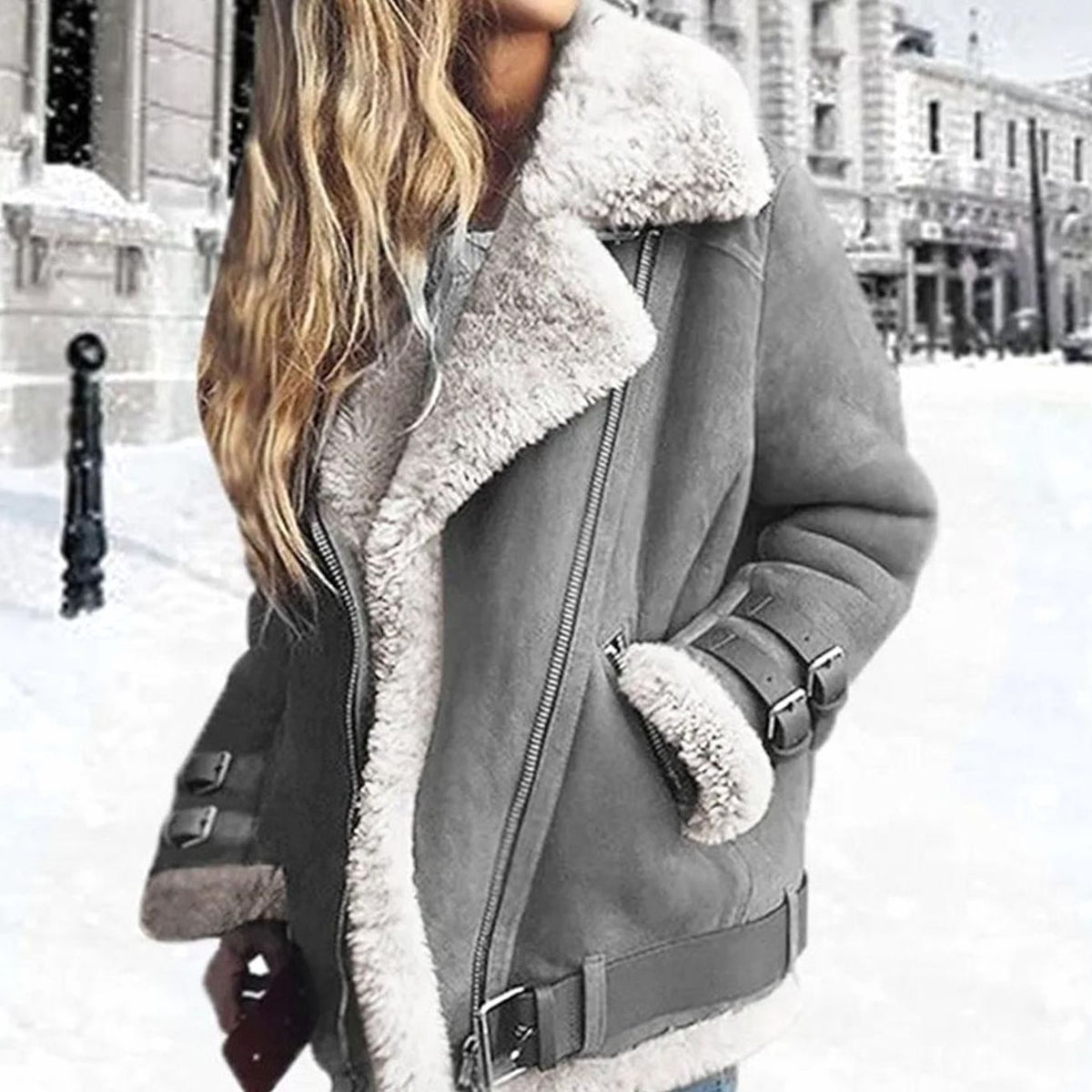 Phileine | Oversized damesmotorjack met imitatie-shearling en ceintuur