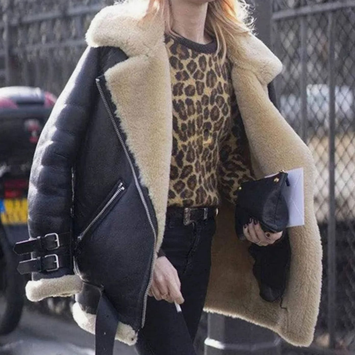 Phileine | Oversized damesmotorjack met imitatie-shearling en ceintuur