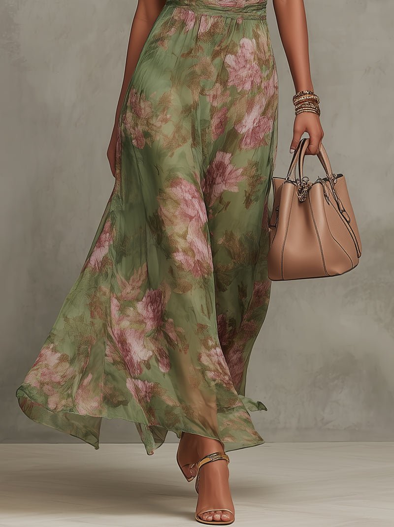 Rochelle | Chiffonmaxijurk met bloemenprint en halterhals