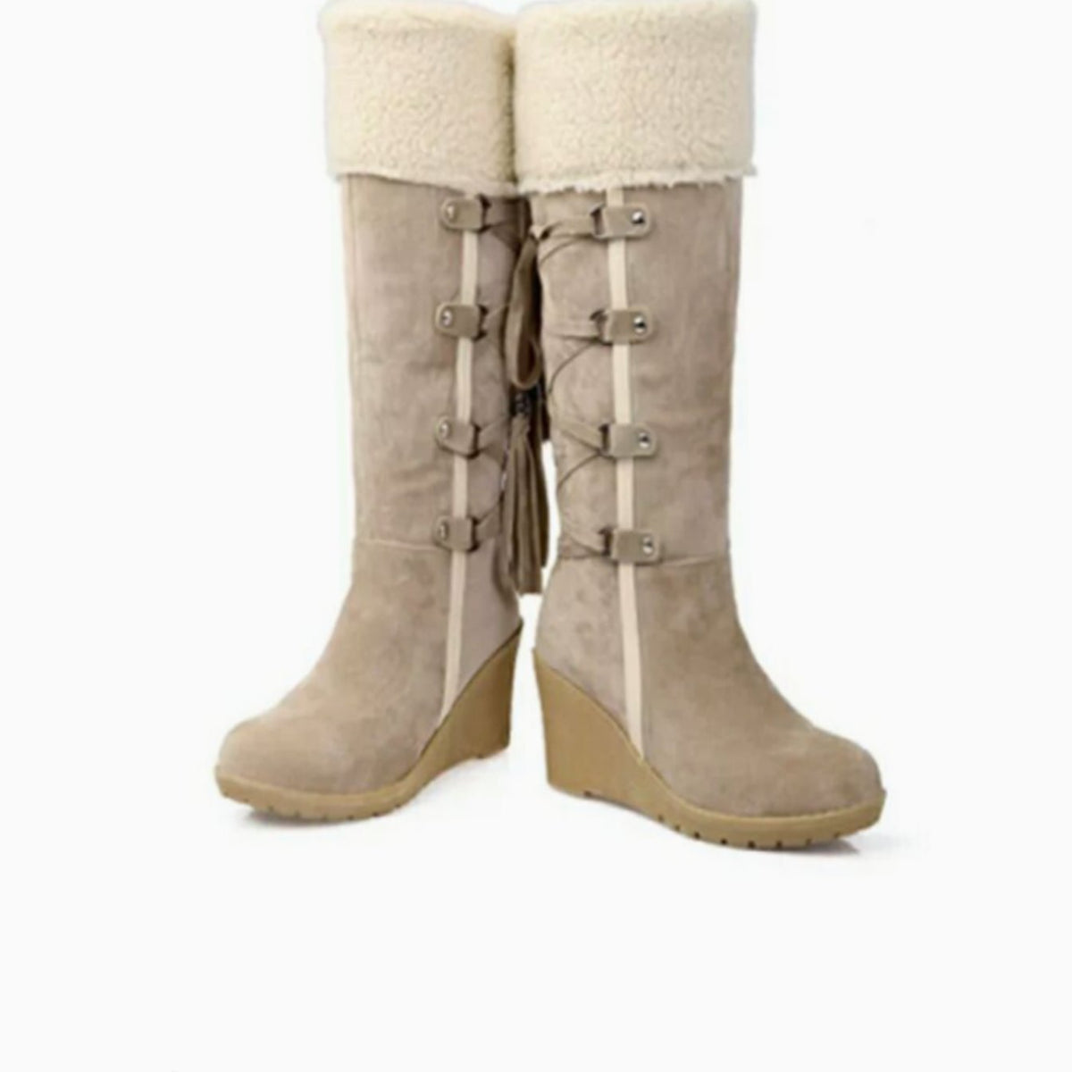 Dames kniehoge winterlaarzen met sleehak, bontboord en kwastjes