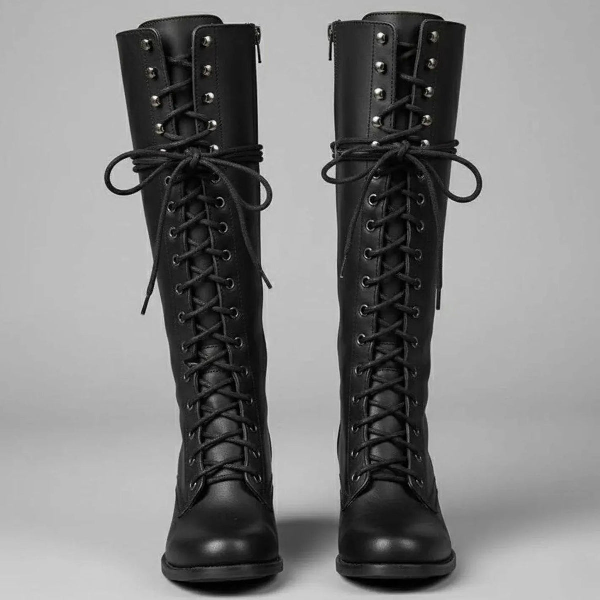 Hoge dameslaarzen van imitatieleer met studs en veters