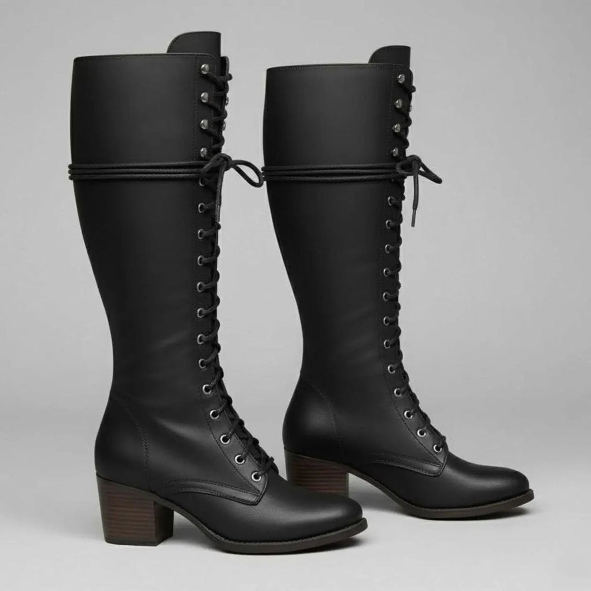 Hoge dameslaarzen van imitatieleer met studs en veters