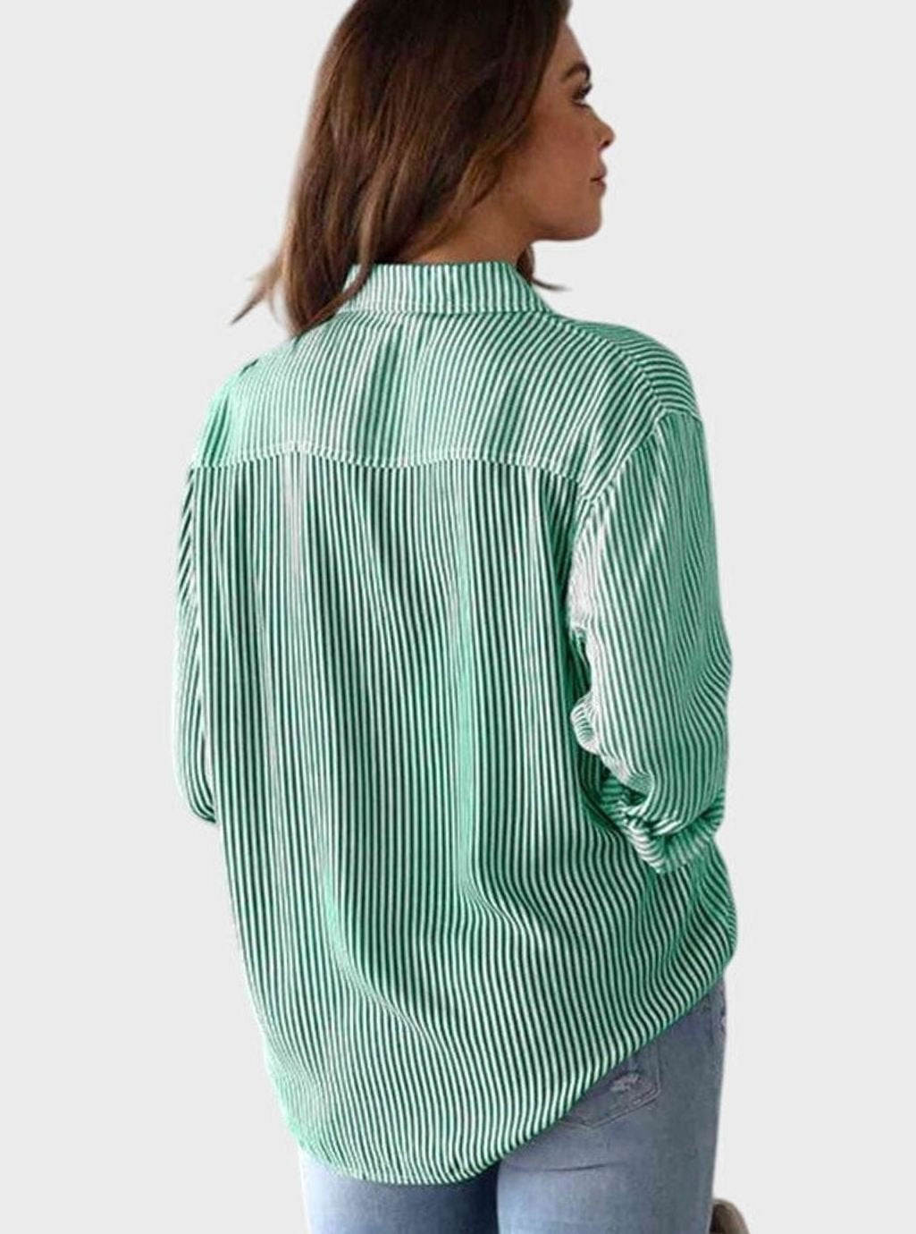 Claudia | Gestreepte damesblouse met knoopsluiting en strikzoom