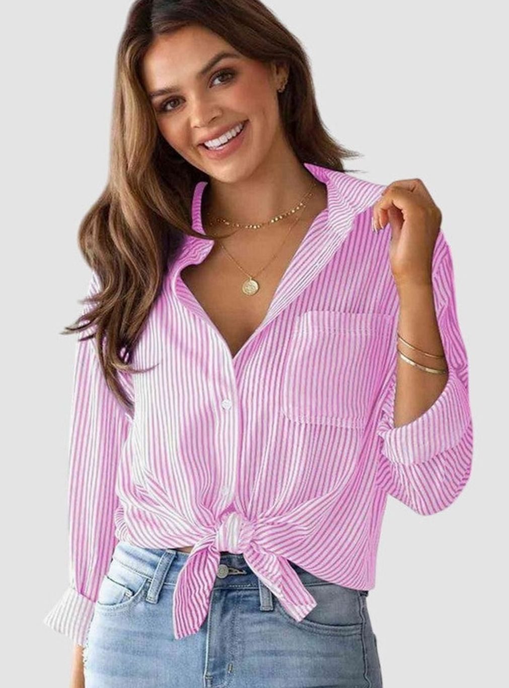 Claudia | Gestreepte damesblouse met knoopsluiting en strikzoom