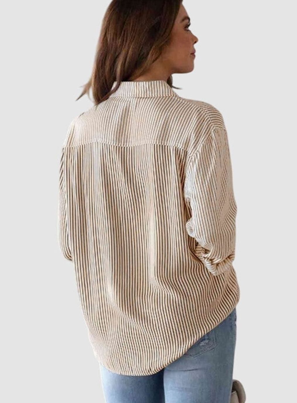 Claudia | Gestreepte damesblouse met knoopsluiting en strikzoom