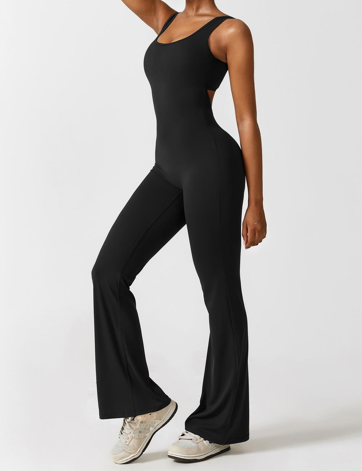 Rugvrije jumpsuit met uitlopende broekspijpen