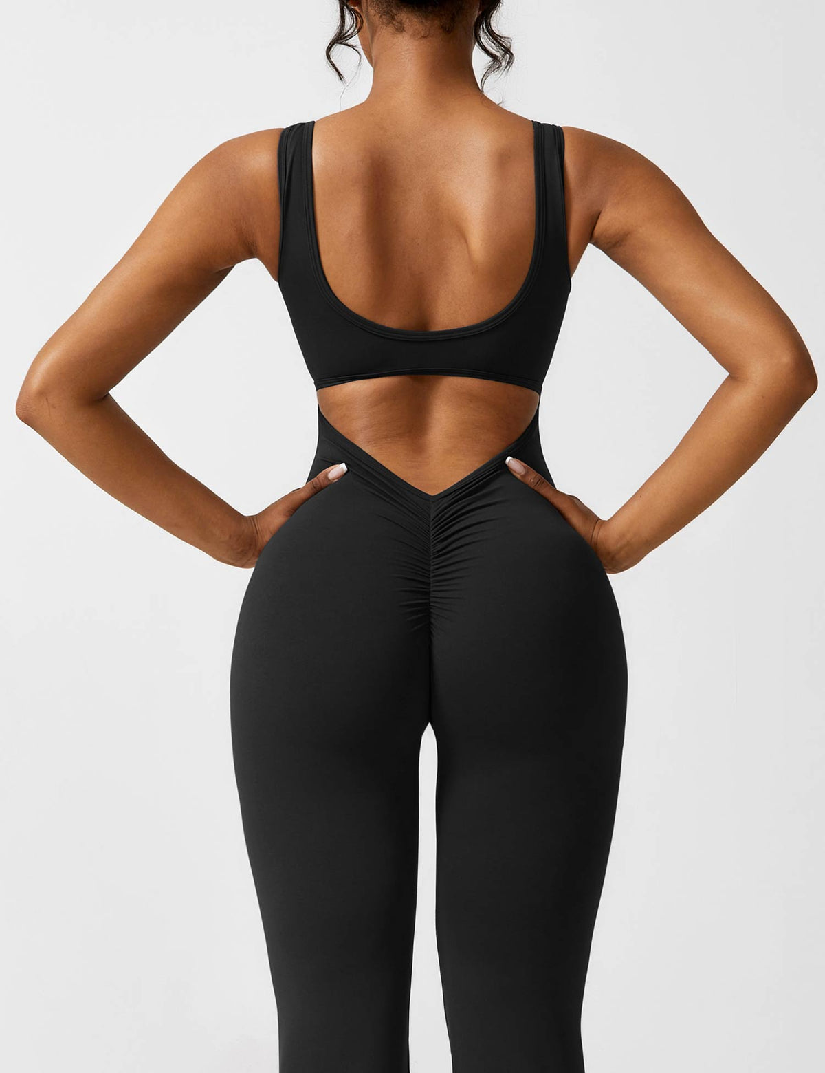 Rugvrije jumpsuit met uitlopende broekspijpen
