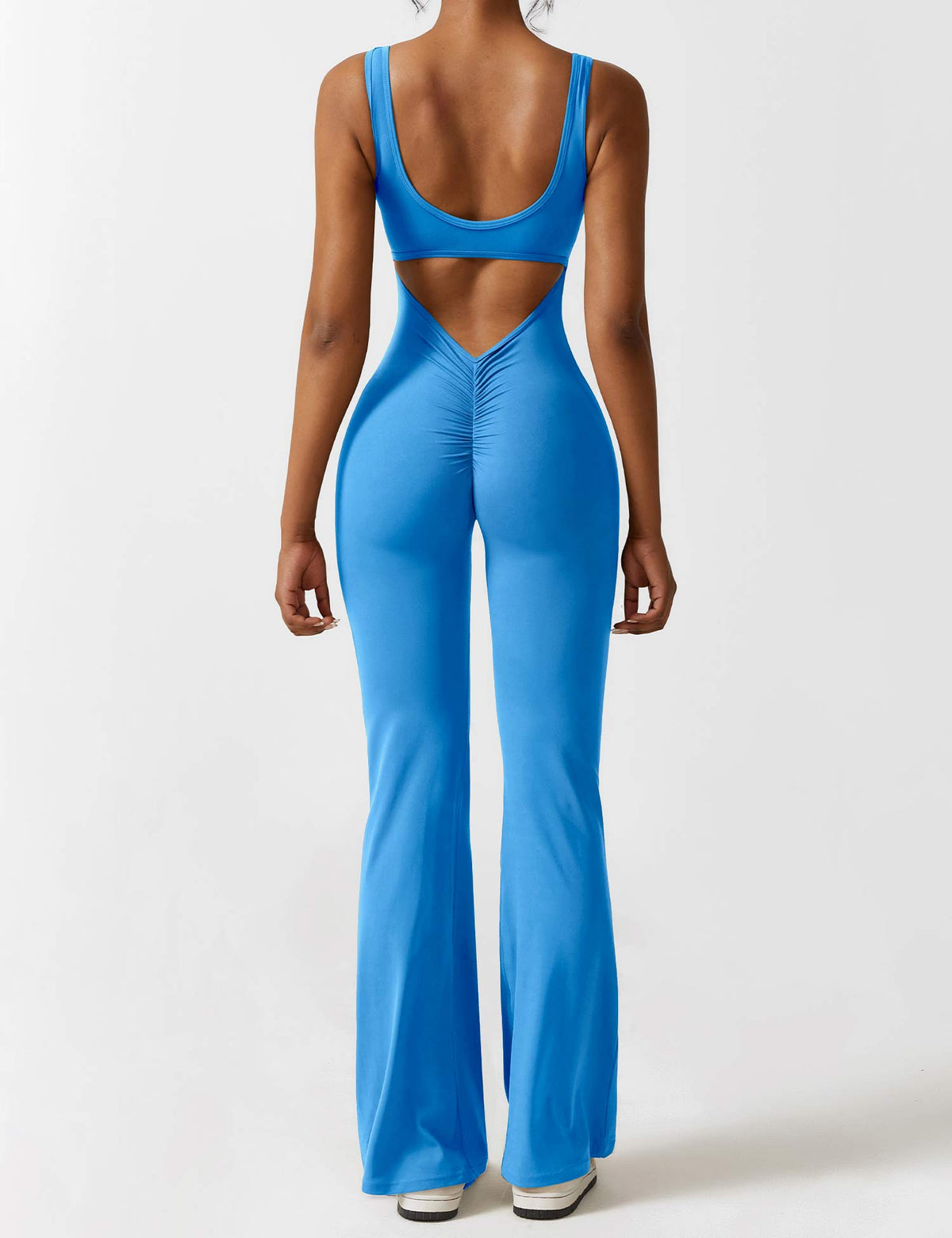 Rugvrije jumpsuit met uitlopende broekspijpen